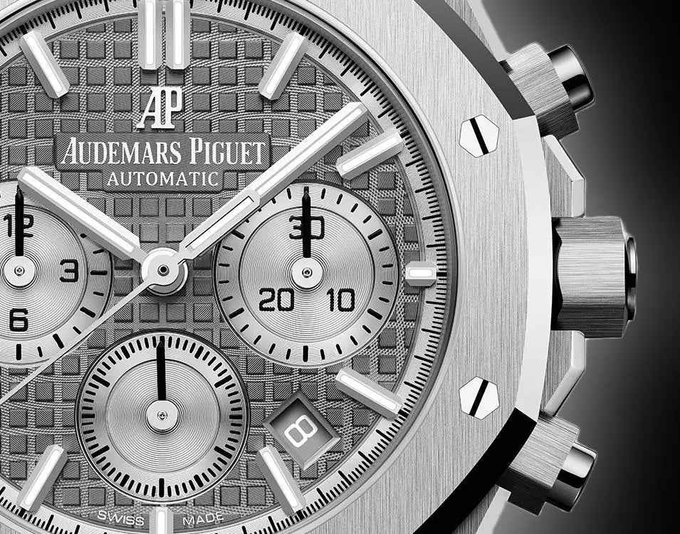 Audemars Piguet Royal Oak men's chronograph watch, grey dial, silver stainless steel bracelet – dial close-up on dark background