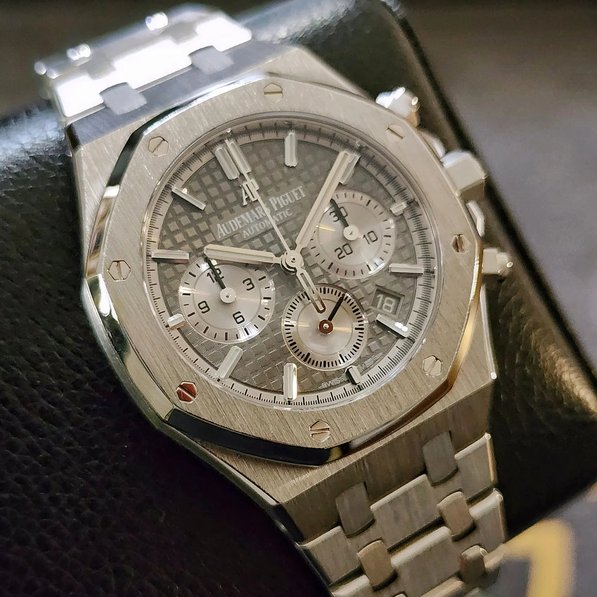 Audemars Piguet Royal Oak men's chronograph watch, grey dial, silver stainless steel bracelet – real-life angle view