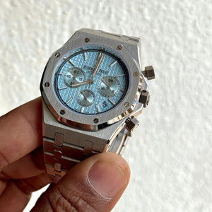 Audemars Piguet Royal Oak men's chronograph watch, light blue dial, silver stainless steel bracelet – in-hand close-up