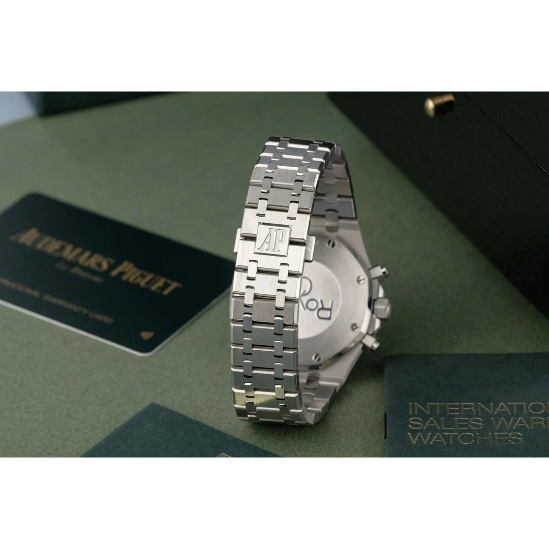Audemars Piguet Royal Oak men's chronograph watch, orange dial, silver stainless steel bracelet – side profile view