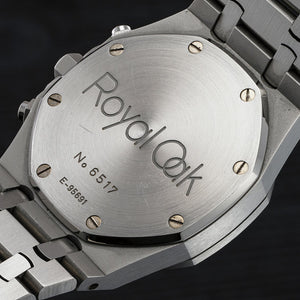 Audemars Piguet Royal Oak men's chronograph watch, yellow dial, silver stainless steel bracelet – caseback view