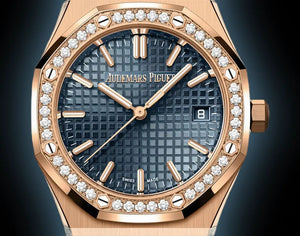 Audemars Piguet Royal Oak women's quartz watch, blue dial, diamond bezel, rose gold bracelet – front view on dark background