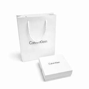 Calvin Klein shopping bag and box on a white background