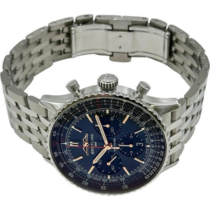 Breitling Navitimer 46mm men's chronograph watch, 46mm stainless steel case, blue dial with dark counters, steel bracelet – angle view