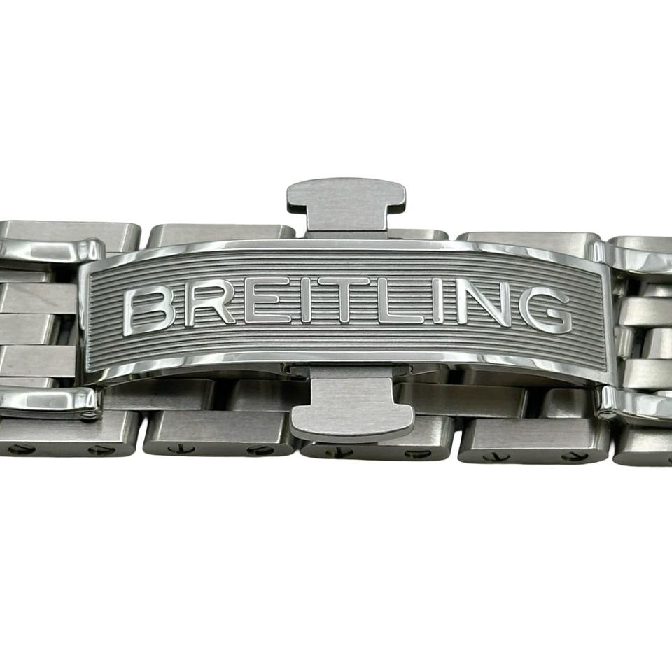 Breitling Navitimer 46mm men's chronograph watch, 46mm stainless steel case, blue dial with dark counters, steel bracelet – clasp logo view