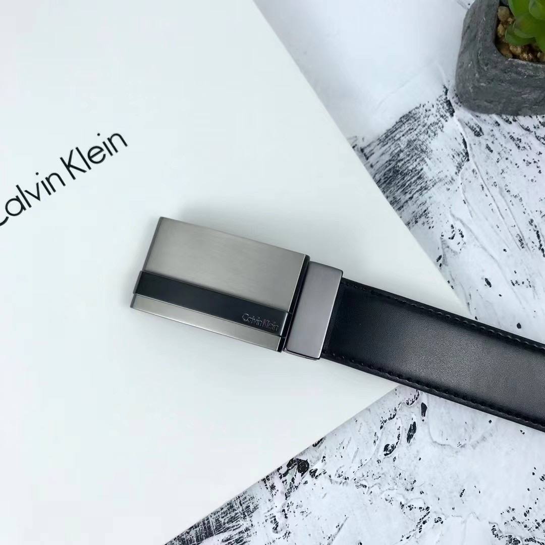 Calvin Klein Black Leather Belt featuring Modern Automatic Ratchet Plaque Buckle