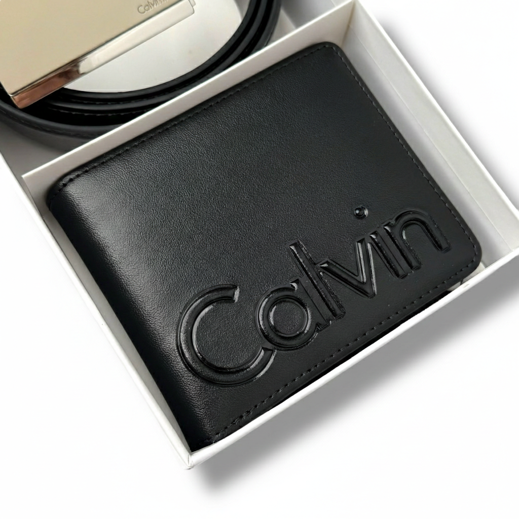 Interior view of open Calvin Klein black leather wallet lying flat showing card slots