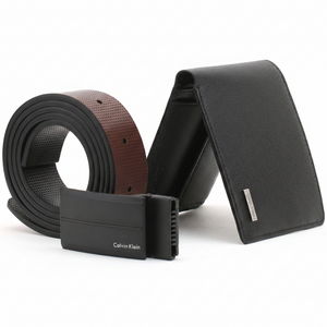 Detailed view of Calvin Klein black pebble grain leather wallet and belt set highlighting the premium textured finish and metal logo plaque