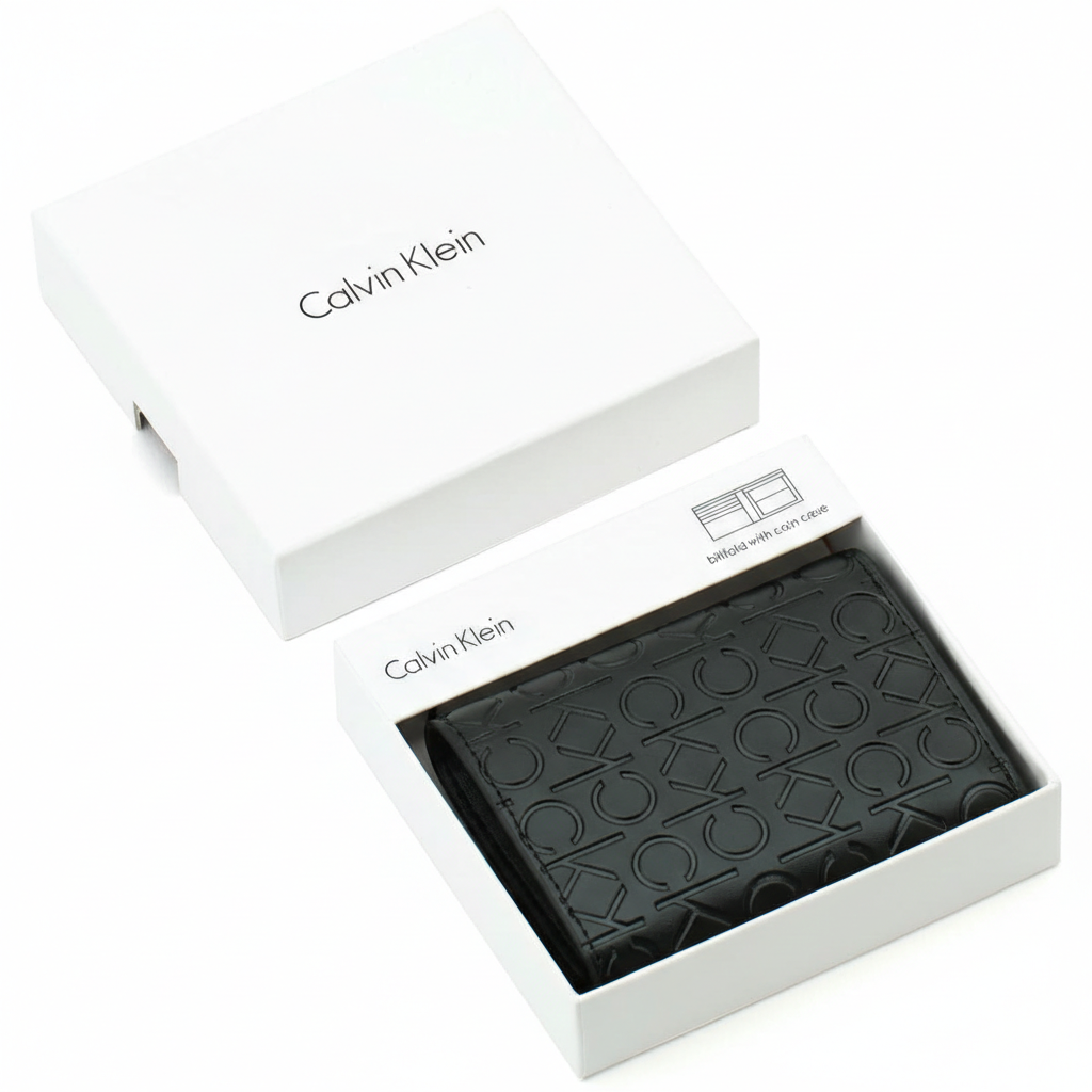 Angled view of a Calvin Klein men's black leather wallet with an embossed CK pattern, elegantly presented inside its original open white gift box