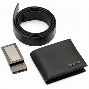Open view of Calvin Klein black leather wallet interior displaying card slots and coin compartment alongside a matching black leather belt