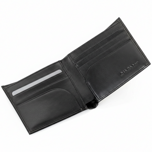 Fully open interior view of a Calvin Klein men's black smooth leather wallet showcasing multiple card slots, debossed branding, and a fold-out passcase flap with a clear ID window