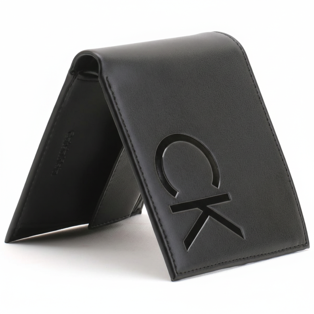 Perspective view of a standing Calvin Klein men's black leather wallet displaying the large exterior CK logo and internal Calvin Klein debossed branding