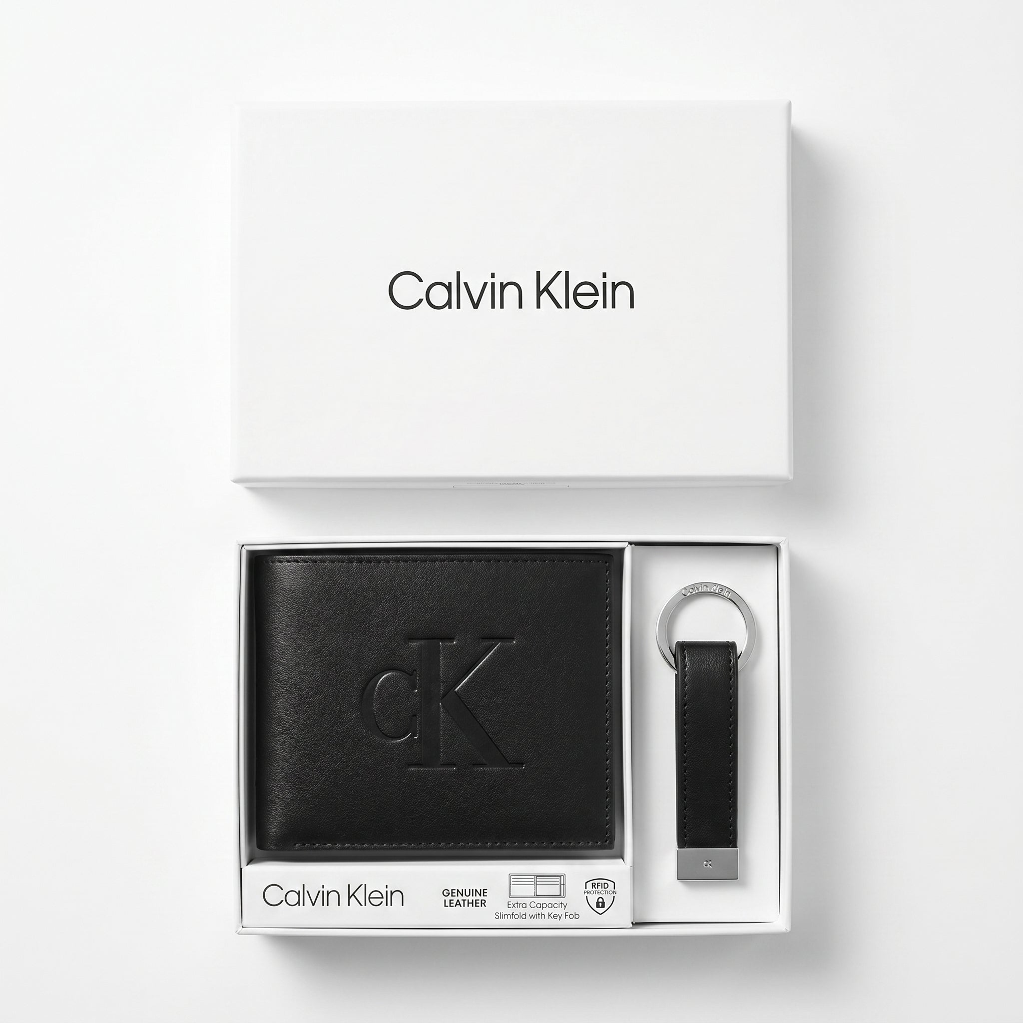 Macro close-up photograph showing the premium smooth leather texture and precision embossed ck logo on the wallet
