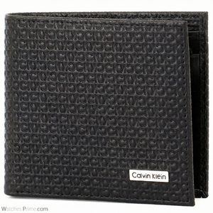 Close up of Calvin Klein Embossed Leather Texture and Silver Metal Logo