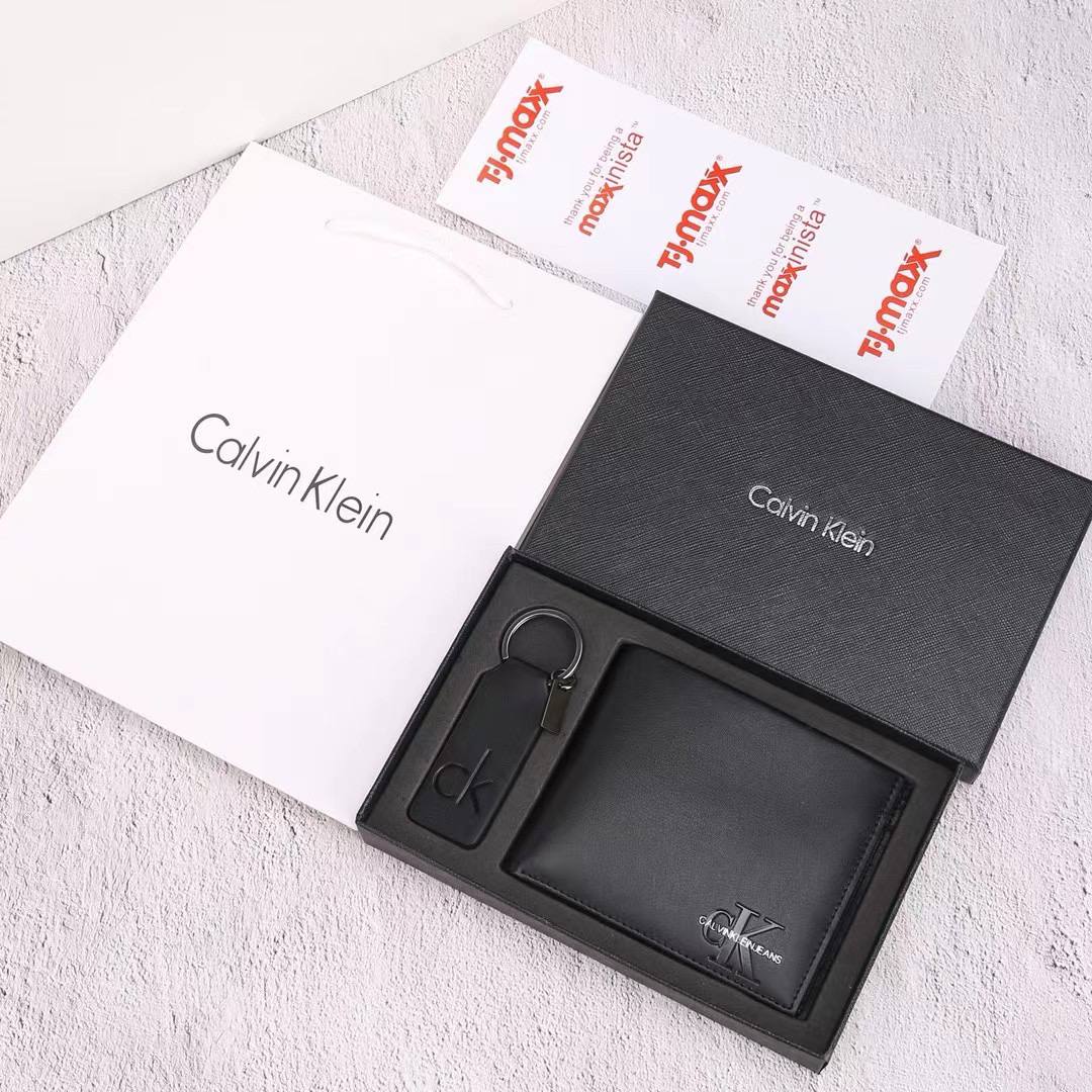 Calvin Klein wallet and keychain set in a box with Tymox branding.