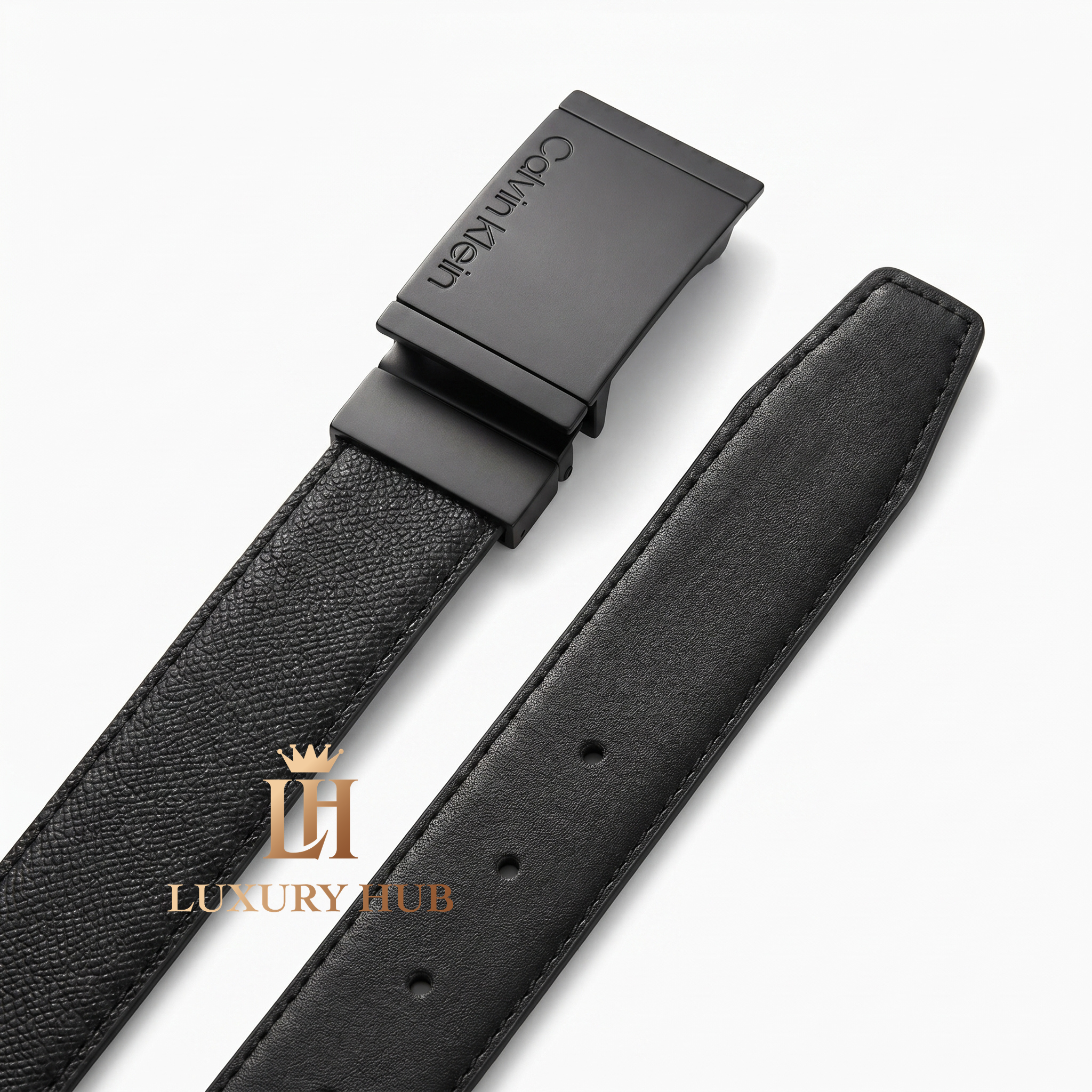 Ultra-realistic close-up of the Calvin Klein matte black plaque buckle featuring the precision-engraved brand logo