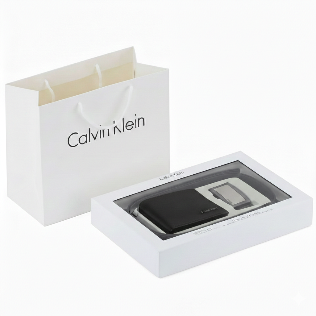 Calvin Klein men's gift set featuring a black smooth leather wallet and belt in a white branded box next to a Calvin Klein gift paper bag