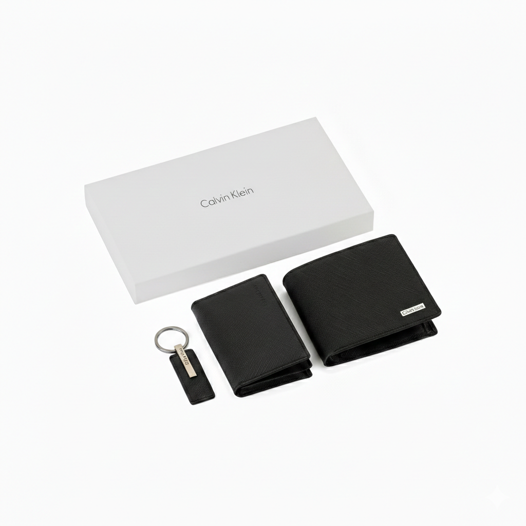 Premium Calvin Klein men's gift set including a black saffiano leather bifold wallet, a matching card holder, and a leather keychain, presented with a luxury white branded gift box