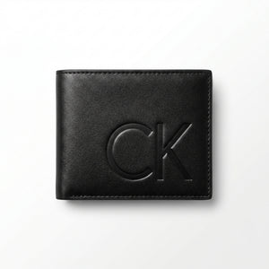 Straight front view product photograph of the Calvin Klein mirror original smooth black leather bifold wallet centered on white background