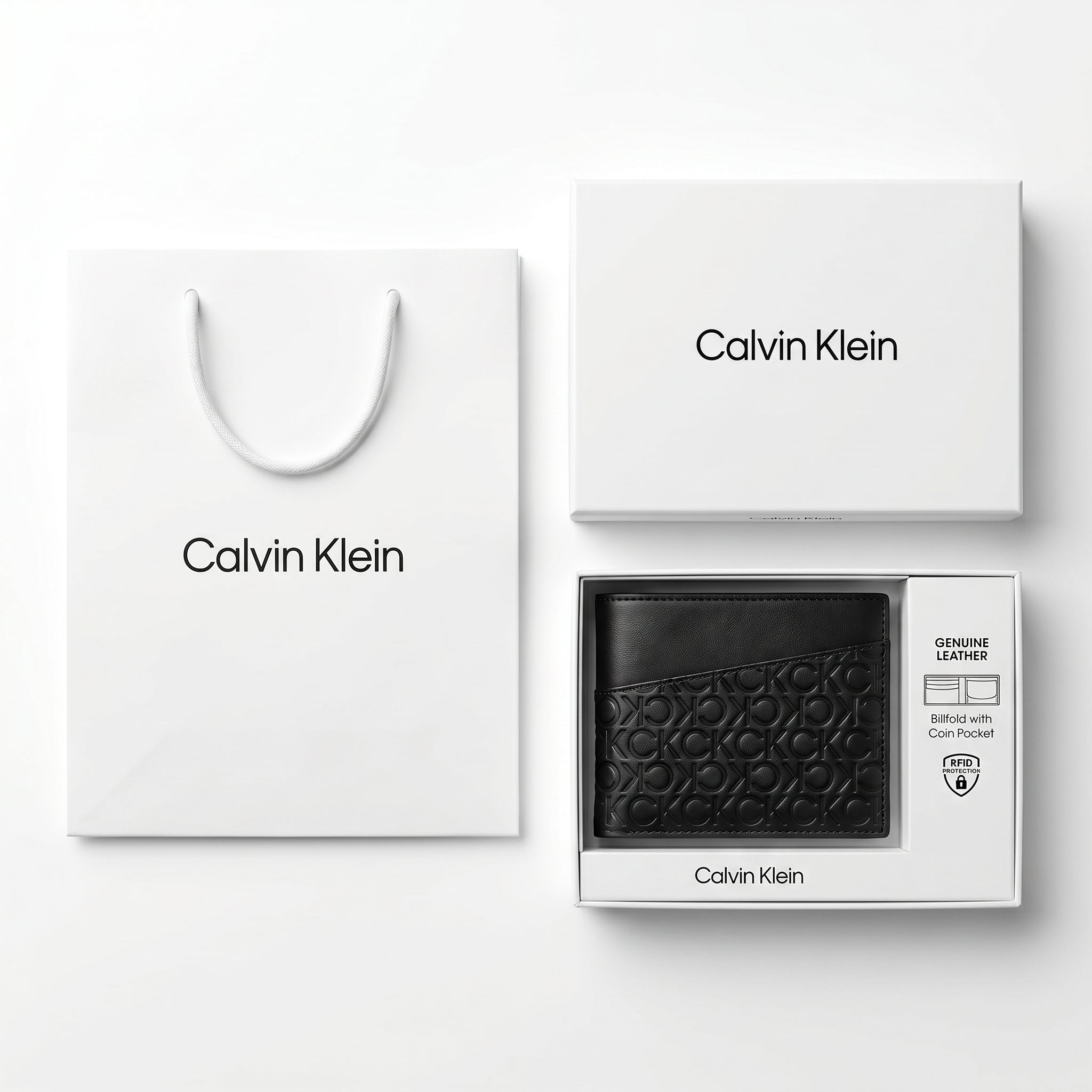 Full luxury presentation of the Calvin Klein mirror original smooth black leather bifold wallet with its premium white branded gift box and matching shopping bag