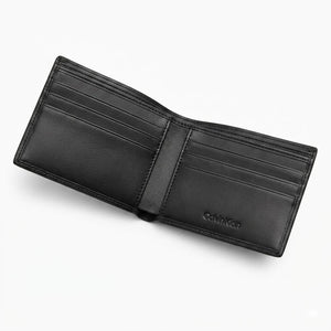 Internal layout view of the opened Calvin Klein mirror original leather bifold wallet showcasing structured card slots, clear ID window, and debossed text branding