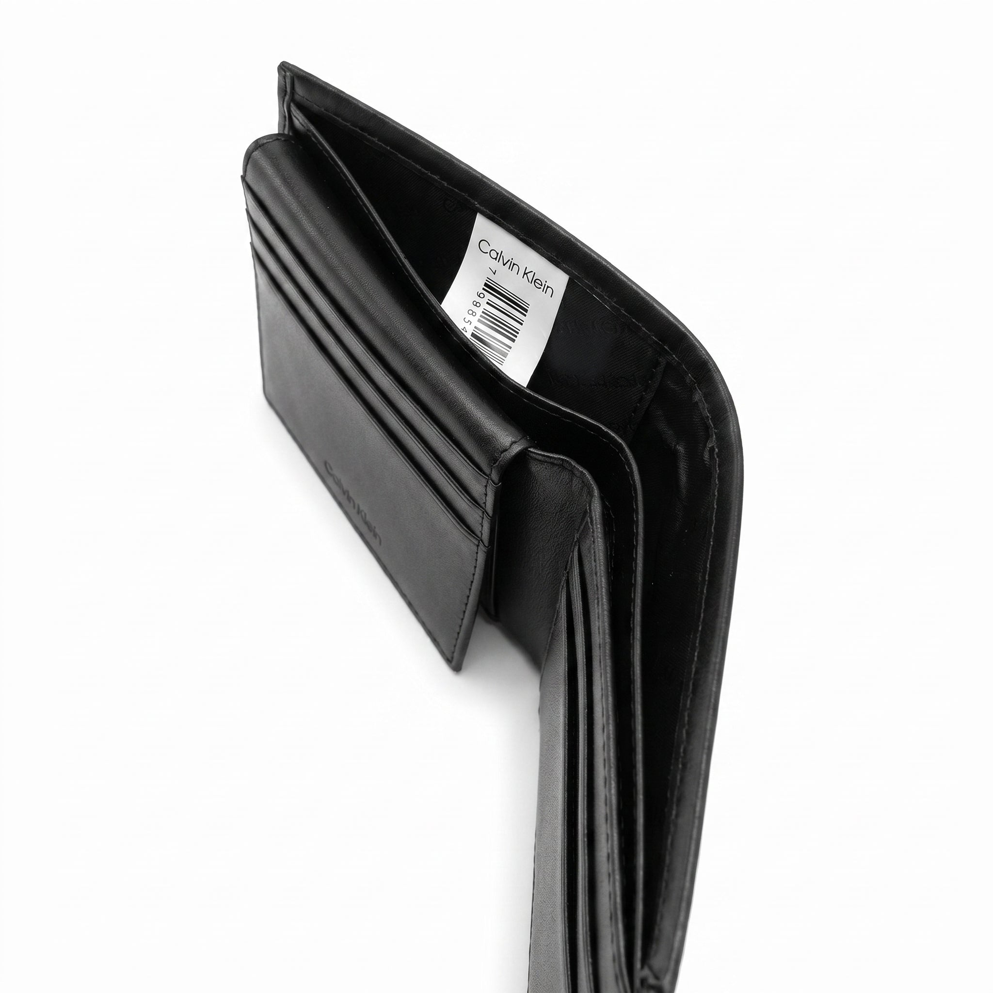 Internal layout view of the opened Calvin Klein mirror original leather bifold wallet showcasing symmetrical card slots and debossed text branding