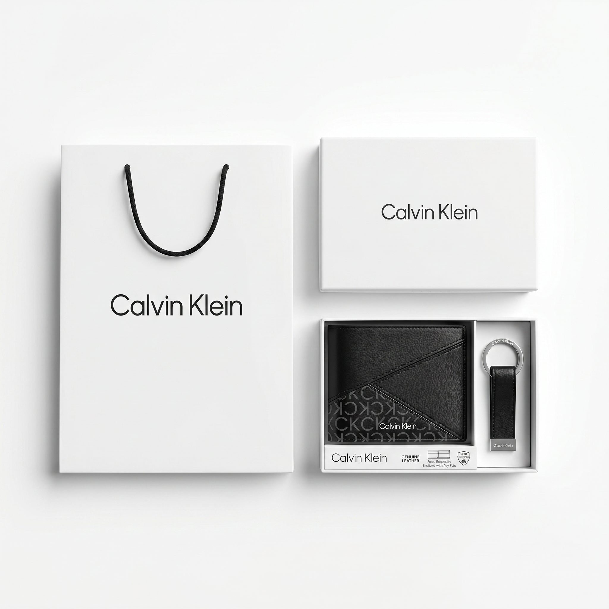 Top-down studio product photography of the Calvin Klein mirror original smooth black leather wallet and matching keychain set neatly arranged inside its open white branded gift box