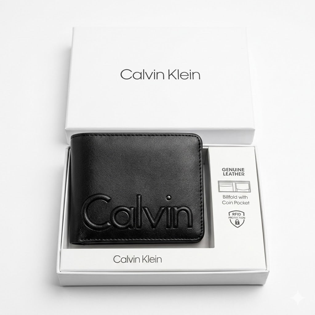 Top-down studio product photography of the Calvin Klein mirror original smooth black leather wallet neatly resting inside its open custom white branded gift box