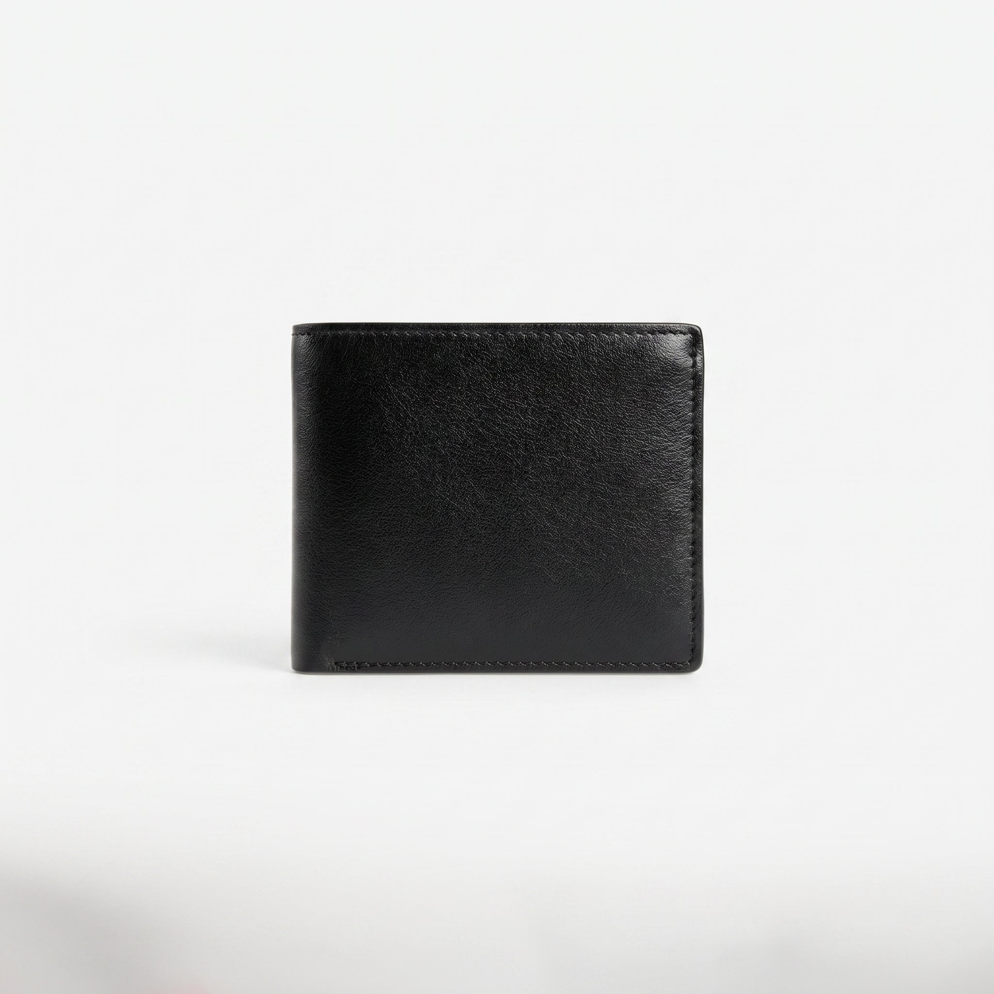 Straight back view product photography of the Calvin Klein mirror original textured black leather wallet showing a minimalist clean stitched layout