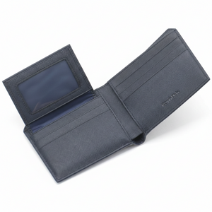 Open interior view of a Calvin Klein men's navy blue leather wallet showcasing multiple card slots, debossed branding, and a practical fold-out passcase flap with a clear ID window