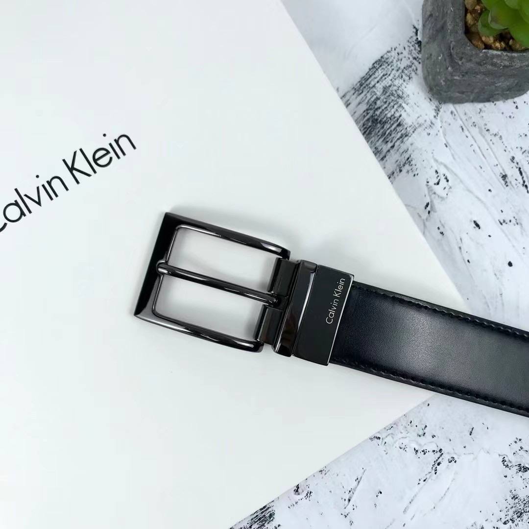 Calvin Klein Black Leather Belt featuring Classic Metal Prong Buckle