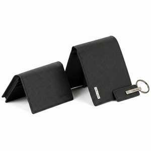 Front perspective of the Calvin Klein men's saffiano leather wallet set featuring elegant silver metal logo plates and high-quality textured finish