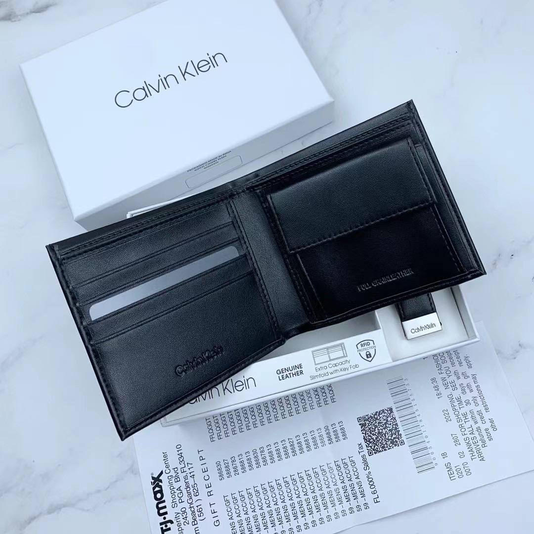 Full interior layout of Calvin Klein wallet with coin pocket on right and slots on left