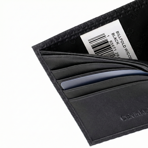 Interior detail of card pockets and logo in Calvin Klein black leather wallet