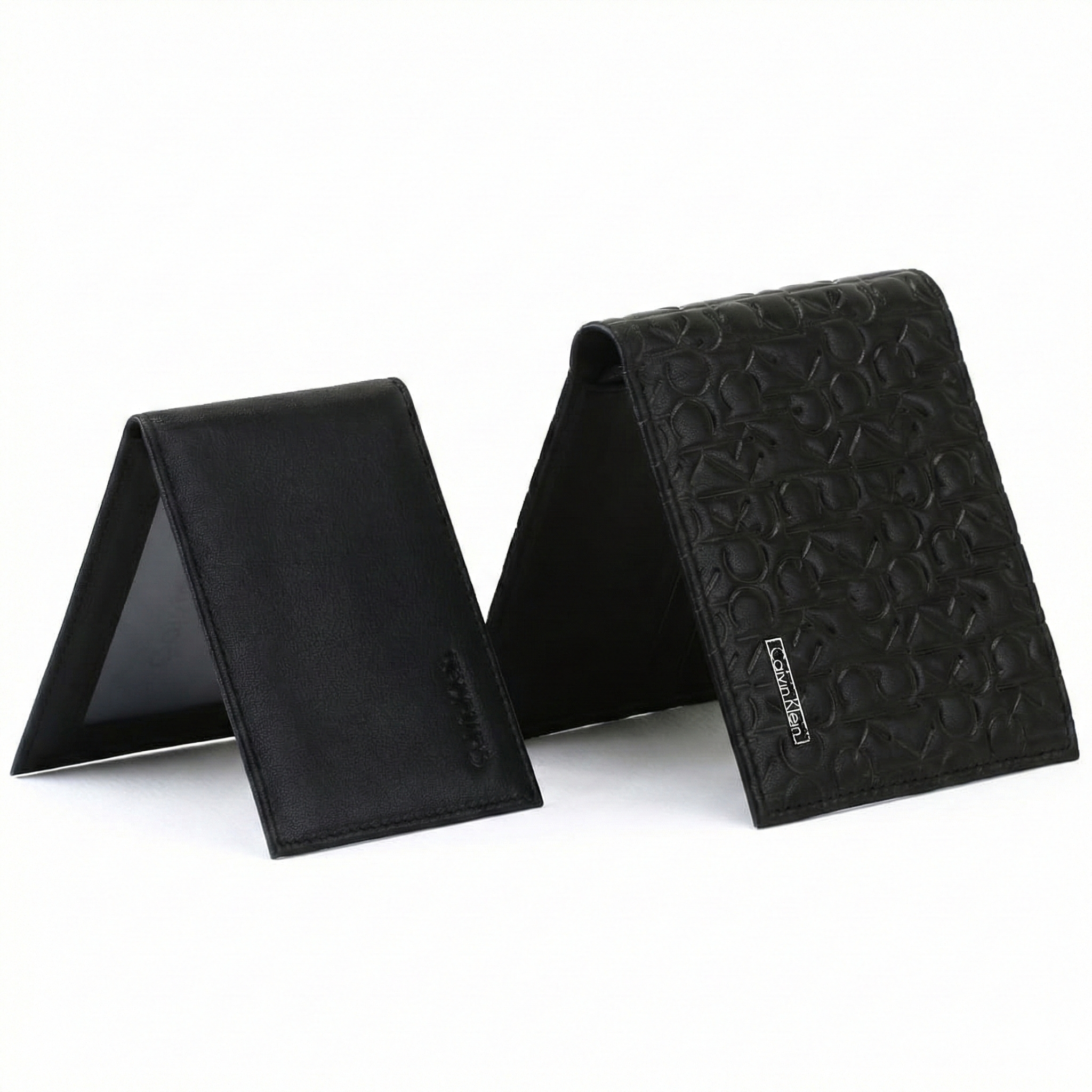 Interior detail of card pockets and logo in Calvin Klein black leather wallet