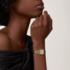 Cartier Panthère de Cartier women's quartz watch, small model case, silver dial, gold-tone bracelet – lifestyle view