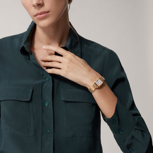 Cartier Panthère de Cartier women's quartz watch, small model case, silver dial, stone-set bezel, rose gold-tone bracelet – lifestyle view