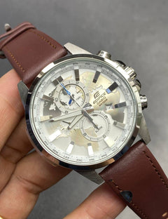 Casio Edifice EFR-303L-7AV men's world time watch, white dial, genuine brown leather strap – in hand view