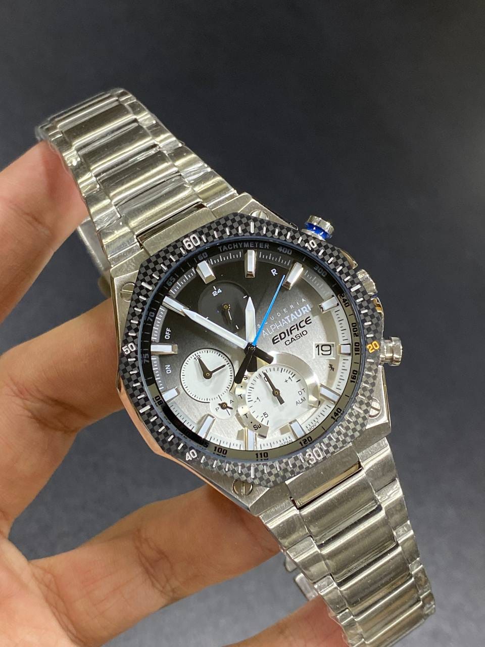 Casio Edifice EQB-1100AT-2A men's chronograph watch, blue dial, silver-tone stainless steel bracelet – in hand view