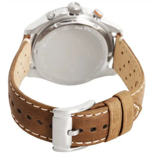 Watch with brown leather strap and silver case on a white background