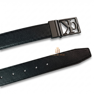 Detailed view of the Calvin Klein black leather belt showing both textured and smooth smooth leather sides