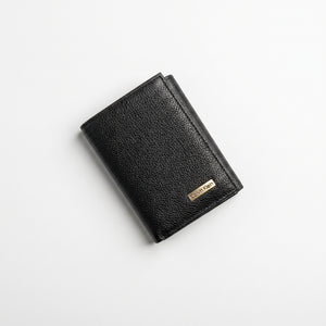 Black leather wallet with a brand logo on a light gray background