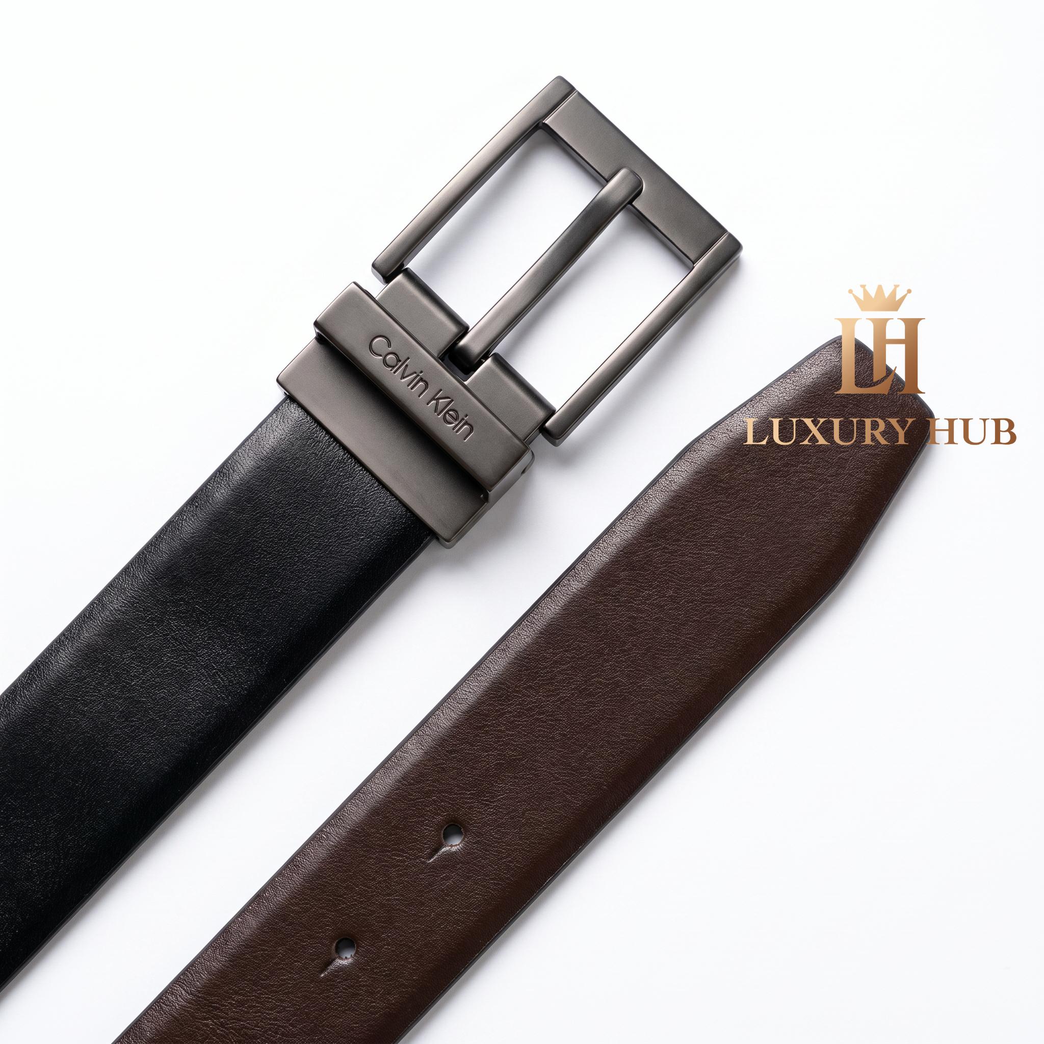 Detailed view of the Calvin Klein double-face belt showing both black and brown leather sides