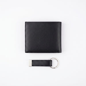 Back view of the Calvin Klein genuine leather wallet and key fob showing the sleek minimalist design and clean stitched edges