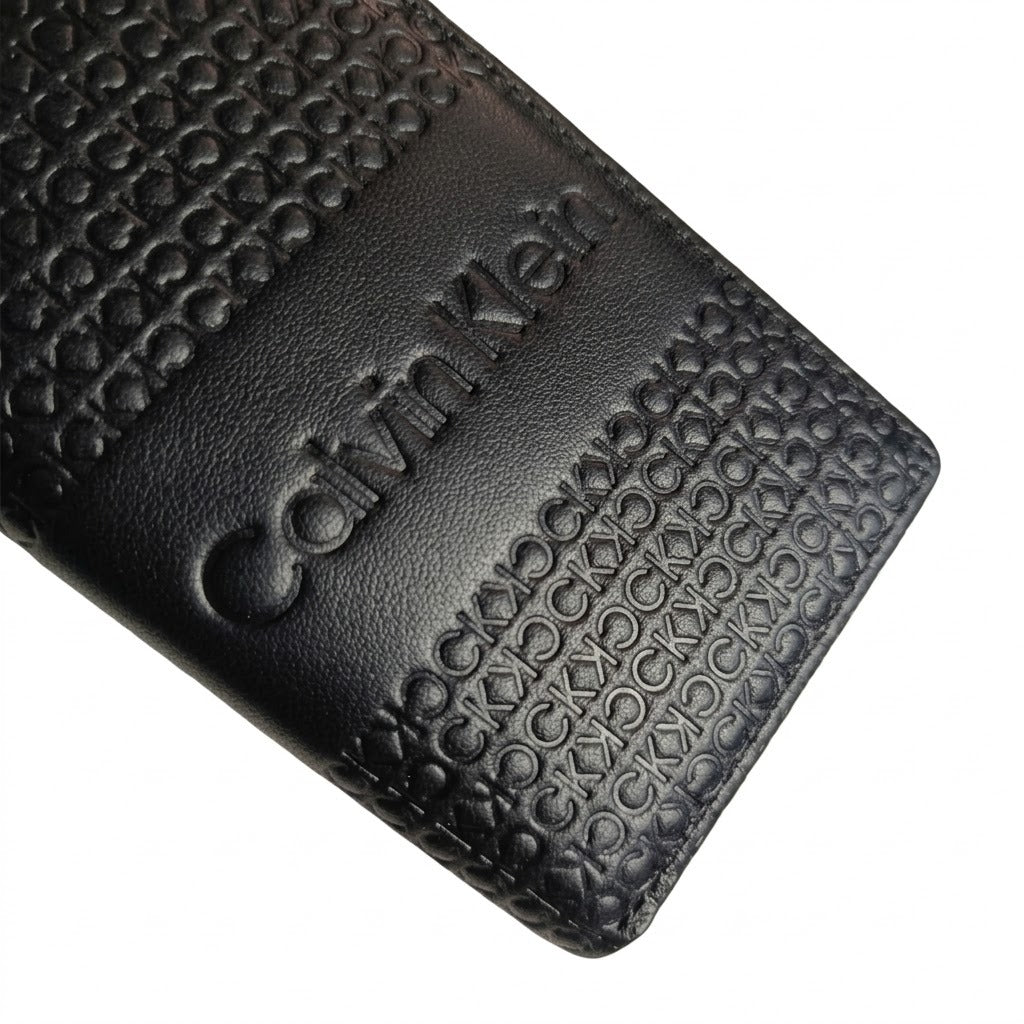 Macro close-up view showing the high-quality genuine leather texture and precision embossed ck monogram on the wallet