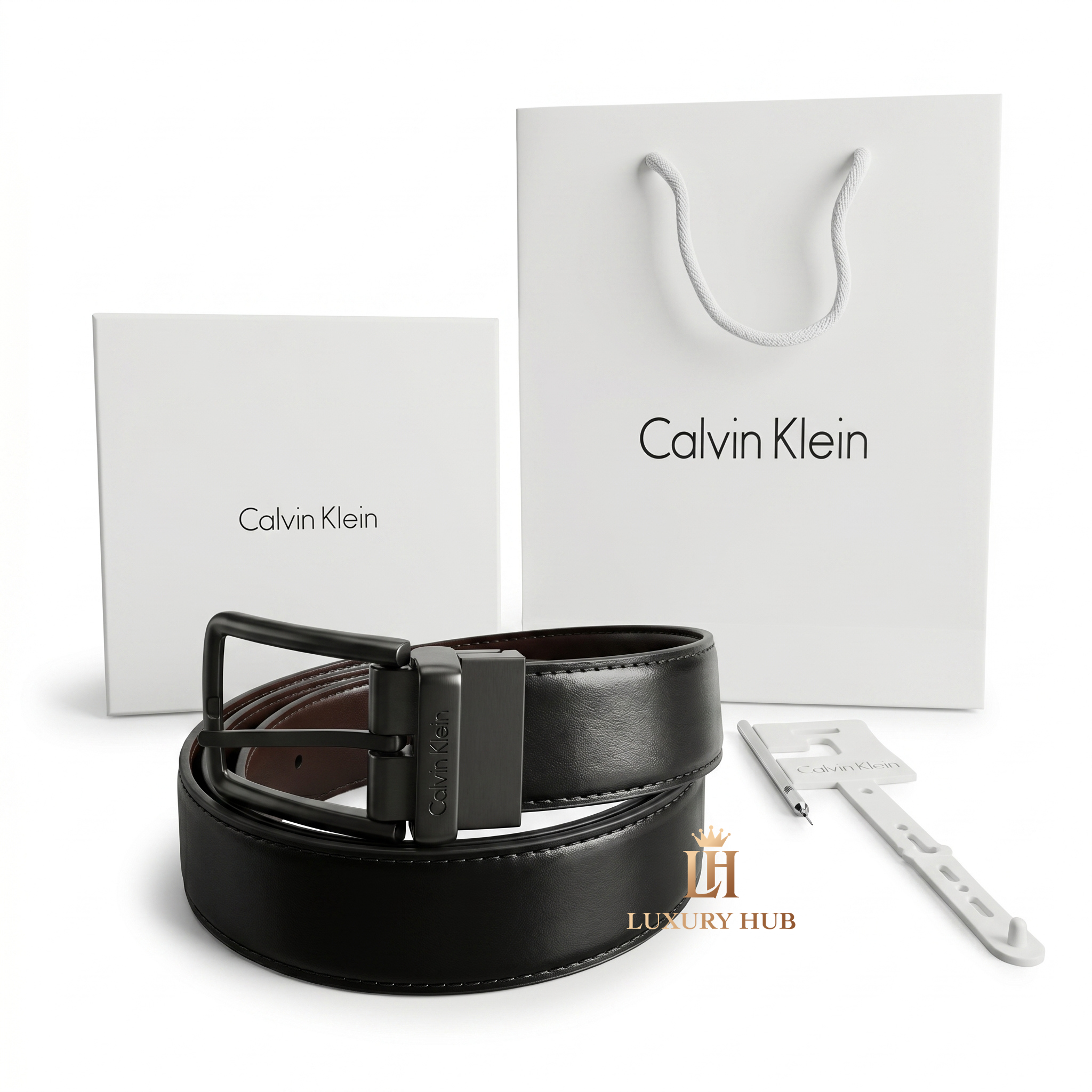 Professional standing view of the Calvin Klein mirror original reversible leather belt featuring the classic matte black buckle