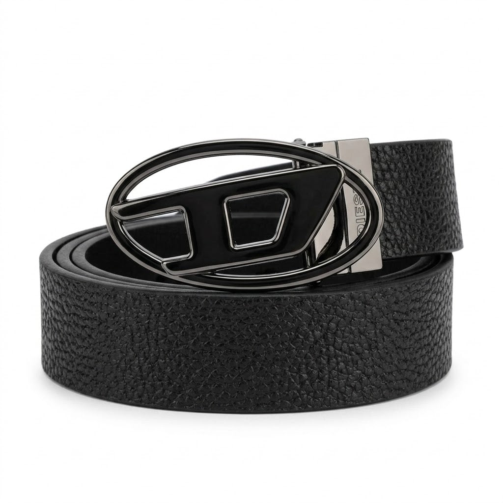 Studio product photograph of the Diesel mirror original pebbled leather belt coiled in an oval shape showcasing the rugged black texture and polished silver hardware