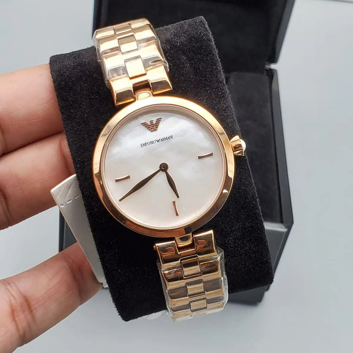 Close up shot of Emporio Armani AR11196 watch on wrist showing the iridescent mother of pearl dial