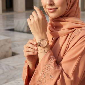 Lifestyle photo of Fossil ES3435 showing the watch on a woman's wrist with rose gold bracelet