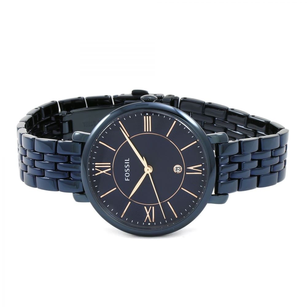 Angled real-life photo of Fossil ES4094 showing the slim navy case and metal strap